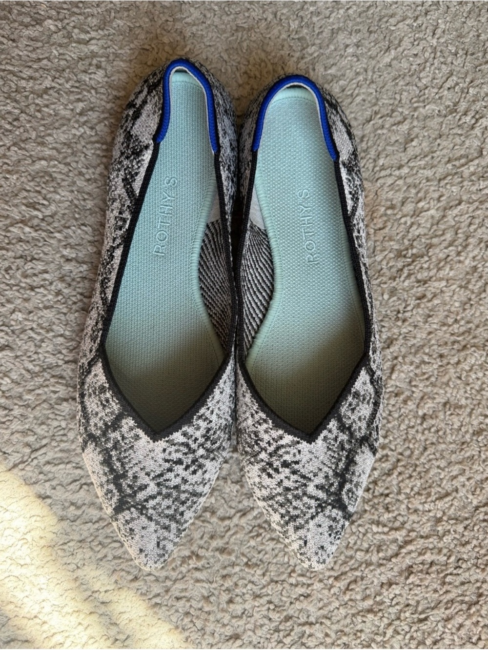 Rothy's Pointed Knit Flats in Black and White Snake Print with Blue Trim